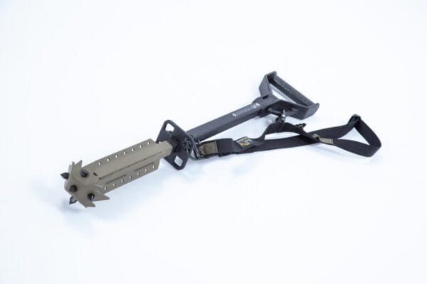 A BR-3-SH SINGLE HEAD BREAK AND RAKE TOOL with a strap attached to it.