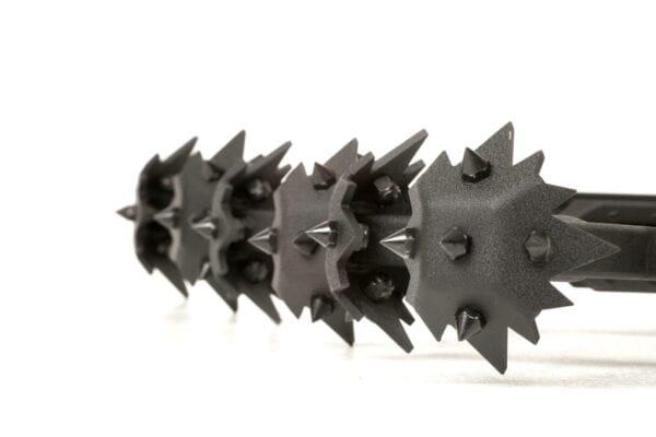A group of black spikes on a white background.
