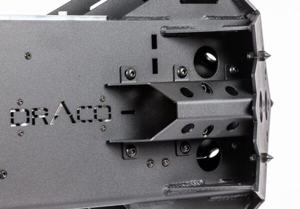 A close up of a metal box with screws on it, featuring the HARD SURFACE BREACHING HEAD BH-1.