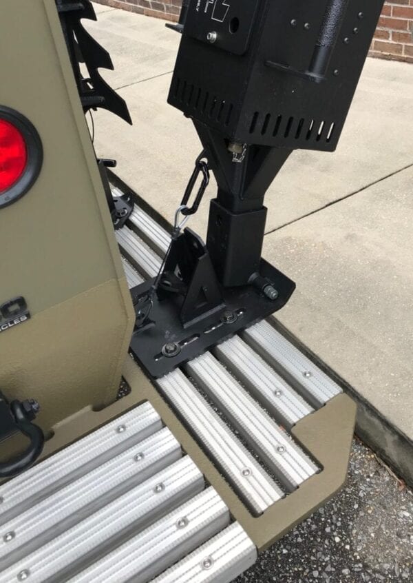A DRACO TRUCK MOUNT with a light attached to the side of it.