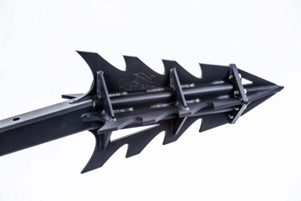 A close up of an arrow with a black blade specifically designed for breaching, resembling the HARD SURFACE BREACHING HEAD BH-1.